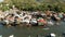 Aerial view Coron city with slums and poor district. Fishermen houses on the water