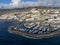 Aerial view on costline with sandy beaches and yachts harbor Puerto Colon on South of Tenerife near Costa Adeje, Canary islands,