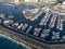 Aerial view on costline with sandy beaches and yachts harbor Puerto Colon on South of Tenerife near Costa Adeje, Canary islands,