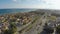 Aerial view of cottage town located on Mediterranean Sea coastline, real estate