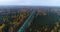 Aerial view country road in autumn forest