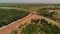 Aerial view of countryside with a cargo train and lakes