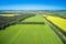 Aerial view of the countryside with grren and yellow fields