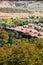 Aerial view of a countryside with vegetation, fields and houses in Romania