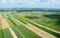 Aerial view of the countryside with village and fields of crops