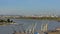 Aerial view on cranes petroleum industry infrastructure along river Scheldt in the port of antwerp