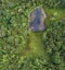 Aerial view of a creek leading to a lake