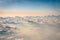 Aerial view of crispy clouds and sky from an airplane