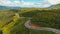 Aerial view of crooked path of road on the mountain.