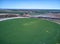 Aerial view of crop field with circular pivot irrigation sprinkler