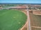 Aerial view of crop field with circular pivot irrigation sprinkler