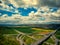 Aerial view of crossroads under clouds near zbraslav summer