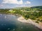 Aerial view of a crowded beach on the shore of a large lake in summer (Ullswater, Lake District, England