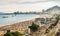 Aerial view of a crowded pre-NYE party Copacabana Beach in Rio de Janeiro, Brazil. The beach is 4km long and is one of