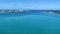 An aerial view of the cruise ship harbor looking out at the turquoise blue ocean in Nassau, Bahamas on a sunny day