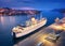 Aerial view of cruise ship at harbor at night