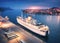 Aerial view of cruise ship at harbor at sunset