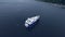 Aerial view of cruise yacht on water. Vacation party on ship. Boat on river