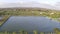 Aerial view cultivated landscape view with many small ponds