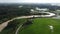 Aerial view curve Sungai Perai near the green paddy field