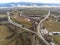 Aerial view, curving dirt roads on agricultural fields