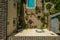 Aerial view of a cute courtyard with pool, garden tables and chairs of a retro building