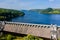 Aerial view of a dam wall and huge reservoir in a rural setting Lake Vyrnwy, Wales