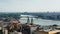 Aerial view of the Danube river, church and roofs in Budapest, sunny day, Hungary
