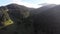 Aerial view of Dawn over the Mountains. Fog and Clouds Hovered Mountain Tops