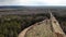 Aerial view deforestation tree cutting spring or autumn grey forest. Ecology.