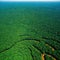 Aerial view of deforested area of the Amazon rainforest caused by illegal mining created with