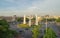 Aerial view of Democracy monument, a roundabout, with cars on busy street road in Bangkok Downtown skyline, urban city at sunset,