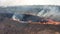 Aerial view of dense smoke spreading outdoors, within the farm