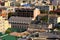 Aerial view of different roofs in the Podil district. The rooftops of buildings. View of buildings with colorful roofs