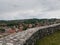 Aerial view of Doboj hilly suburbs from medieval fortress Gradina during overcast summer day