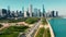 Aerial view Downtown Chicago and Lake Michigan on a sunny day. Vehicle traffic per day moving along the highway