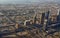 Aerial view of downtown Dubai showing commercial buildings, freeways and residential areas