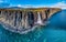 Aerial view of the dramatic coastline at the cliffs by Staffin with the famous Kilt Rock waterfall - Isle of Skye -