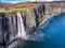 Aerial view of the dramatic coastline at the cliffs by Staffin with the famous Kilt Rock waterfall - Isle of Skye -