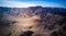 Aerial view on dried river Rio Grande basin on Nazca desert with Nazca lines in the middle, surrounded by mountains.