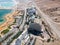 Aerial view from a drone of the beach on the Ein Bokek embankment on the coast of the Dead Sea and the sea itself, in Israel