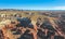 Aerial view from drone of a beautiful rise of red and orange rock formations due to erosion on the Toadstool Trail in