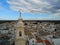 Aerial View by Drone of the Belltower of the Church of the Nativity in the City of Noci, near Bari, in Italy