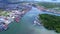 Aerial view Drone Camera of boats in Koh Sirey fishing port Phuket Thailand,fisherman boats at the harbor in Phuket province to tr