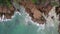 Aerial view Drone camera of seashore rocks in ocean, Beautiful sea surface, Amazing sea waves crashing on rocks seascape