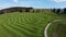 Aerial view with drone of field where farmer left stripes