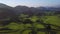 Aerial view drone flight above canola flower field, Luoping, China