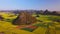 Aerial view drone flight above canola flower field, Luoping, China