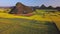 Aerial view drone flight above canola flower field, Luoping, China