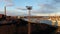 Aerial view of drone flight on power plant area and building with chimneys and cranes, in Helsinki Marihaka district, Finland